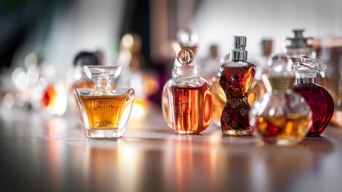 A gathering of small perfume flacons on the atelier bench